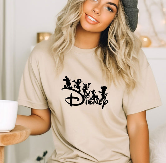 a woman wearing a disney shirt and a hat