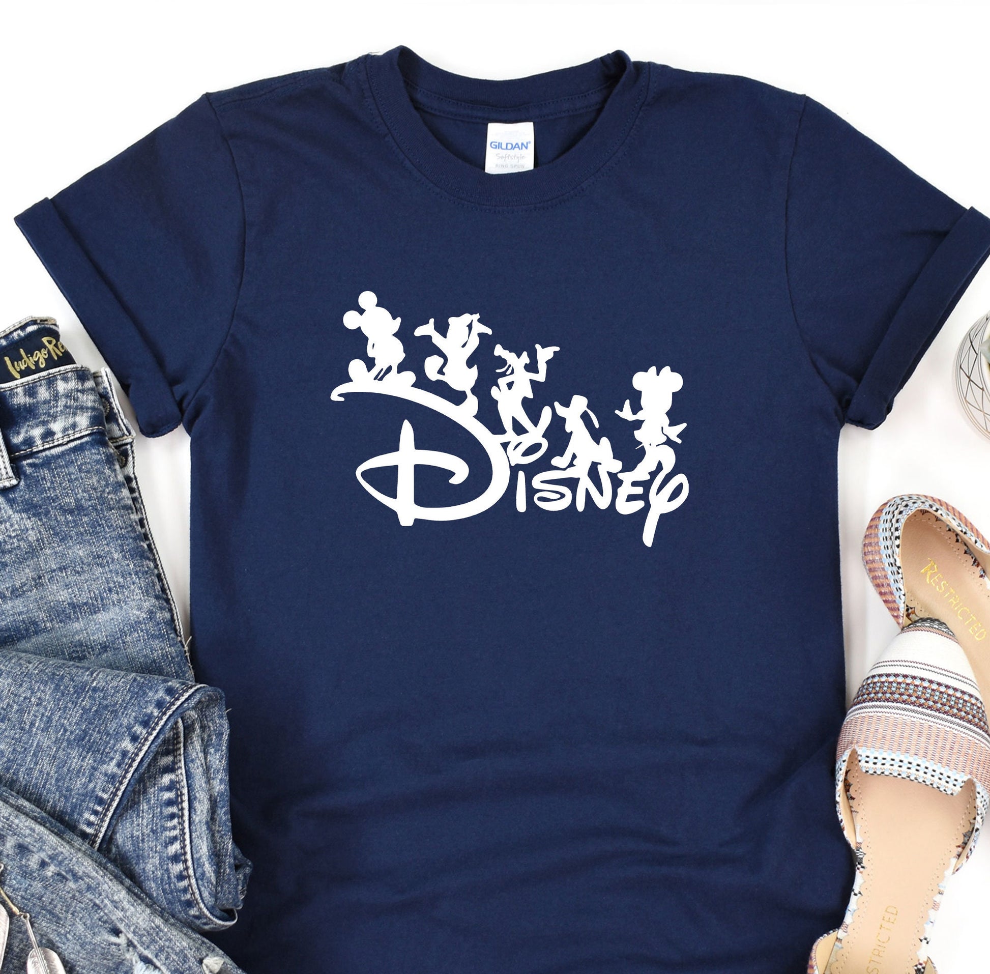 a t - shirt with the disney logo on it