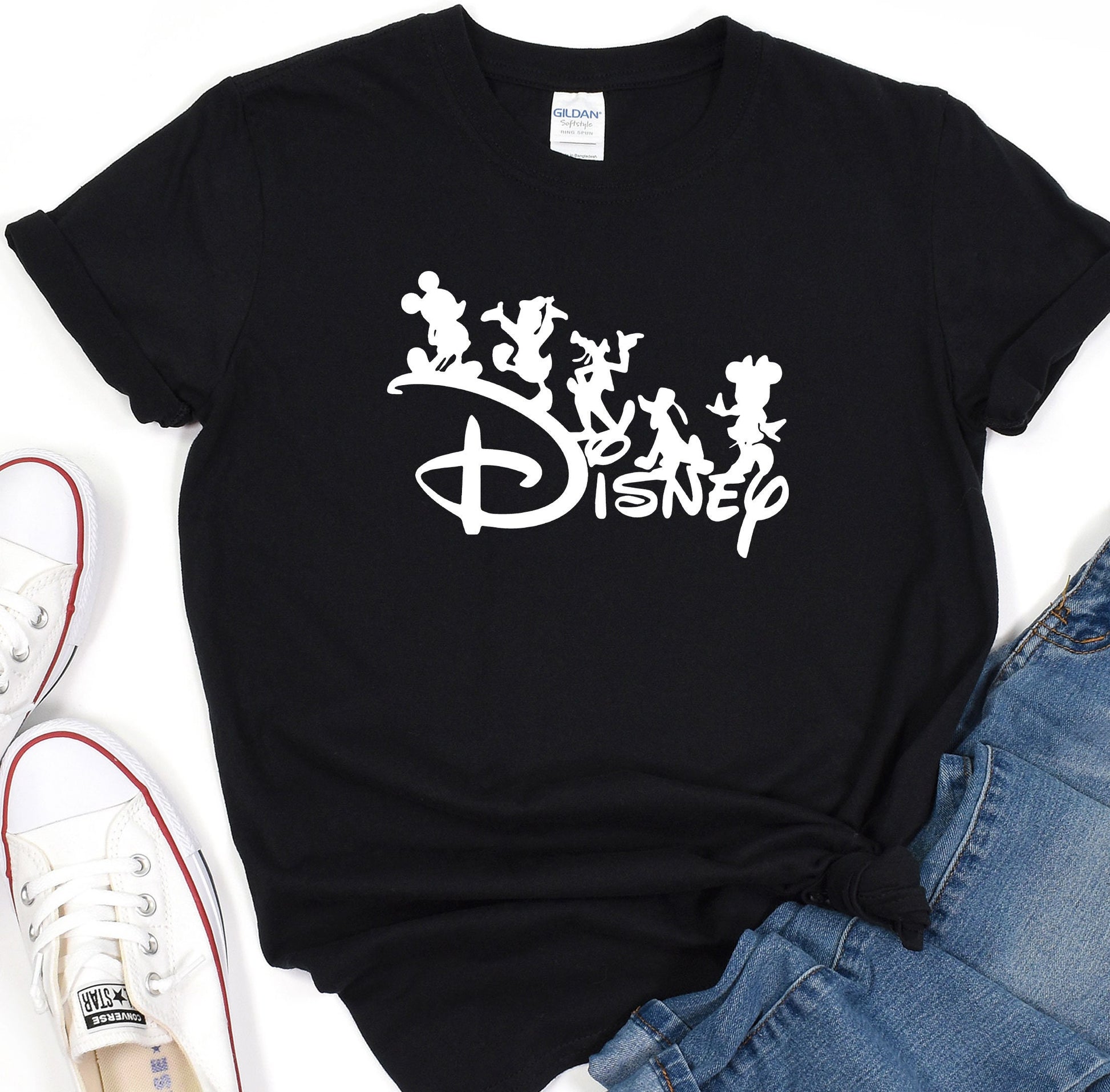 a black tshirt with disney characters on it