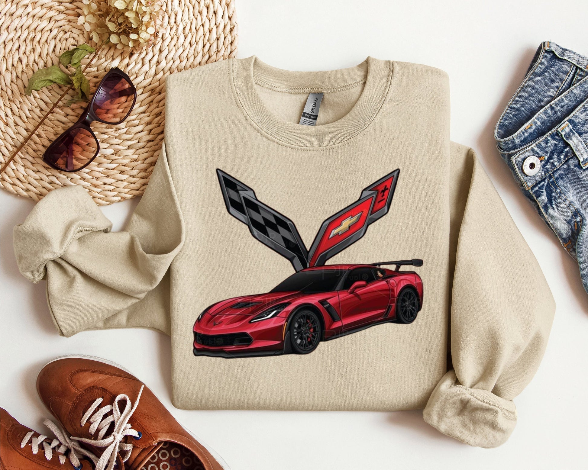 a sweater with a picture of a car on it