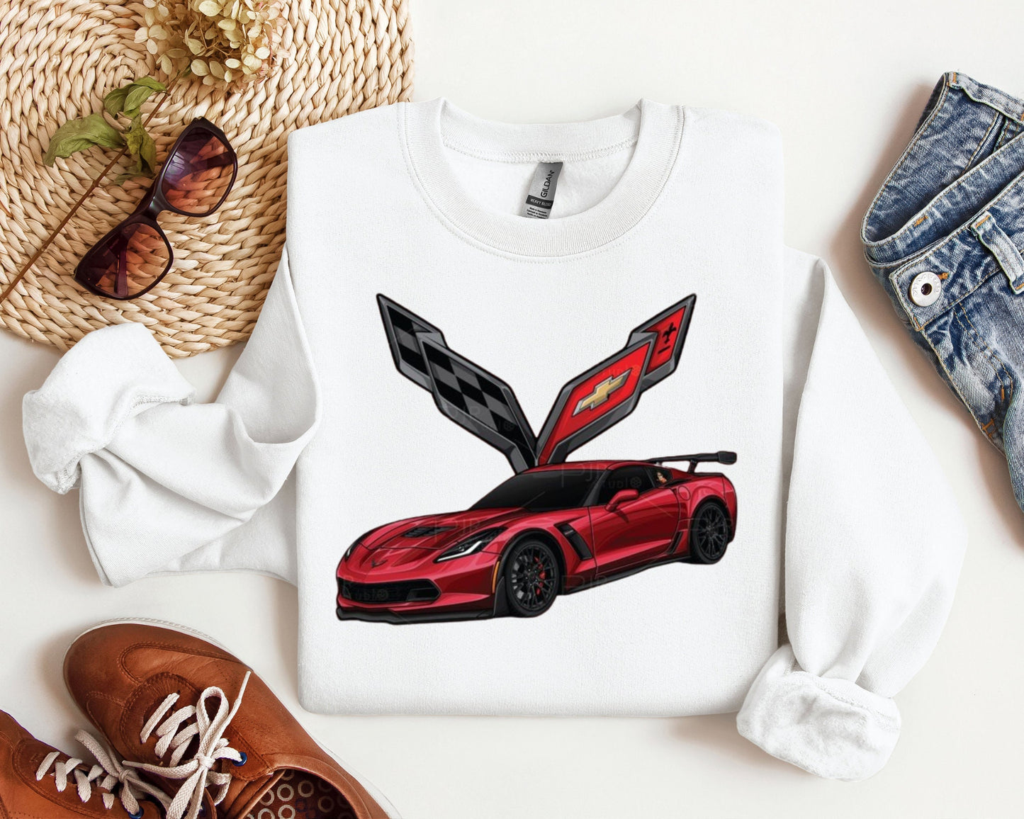 a white shirt with a red sports car on it