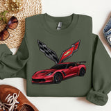 a green sweatshirt with a red sports car on it