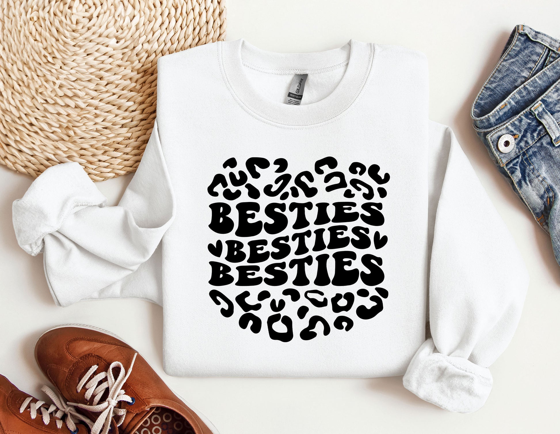 a white sweatshirt with the words besties besties on it