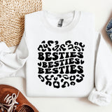 a white sweatshirt with the words besties besties on it