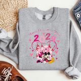 a sweater with a mickey mouse and minnie mouse on it