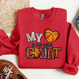 a red sweatshirt with a basketball on it