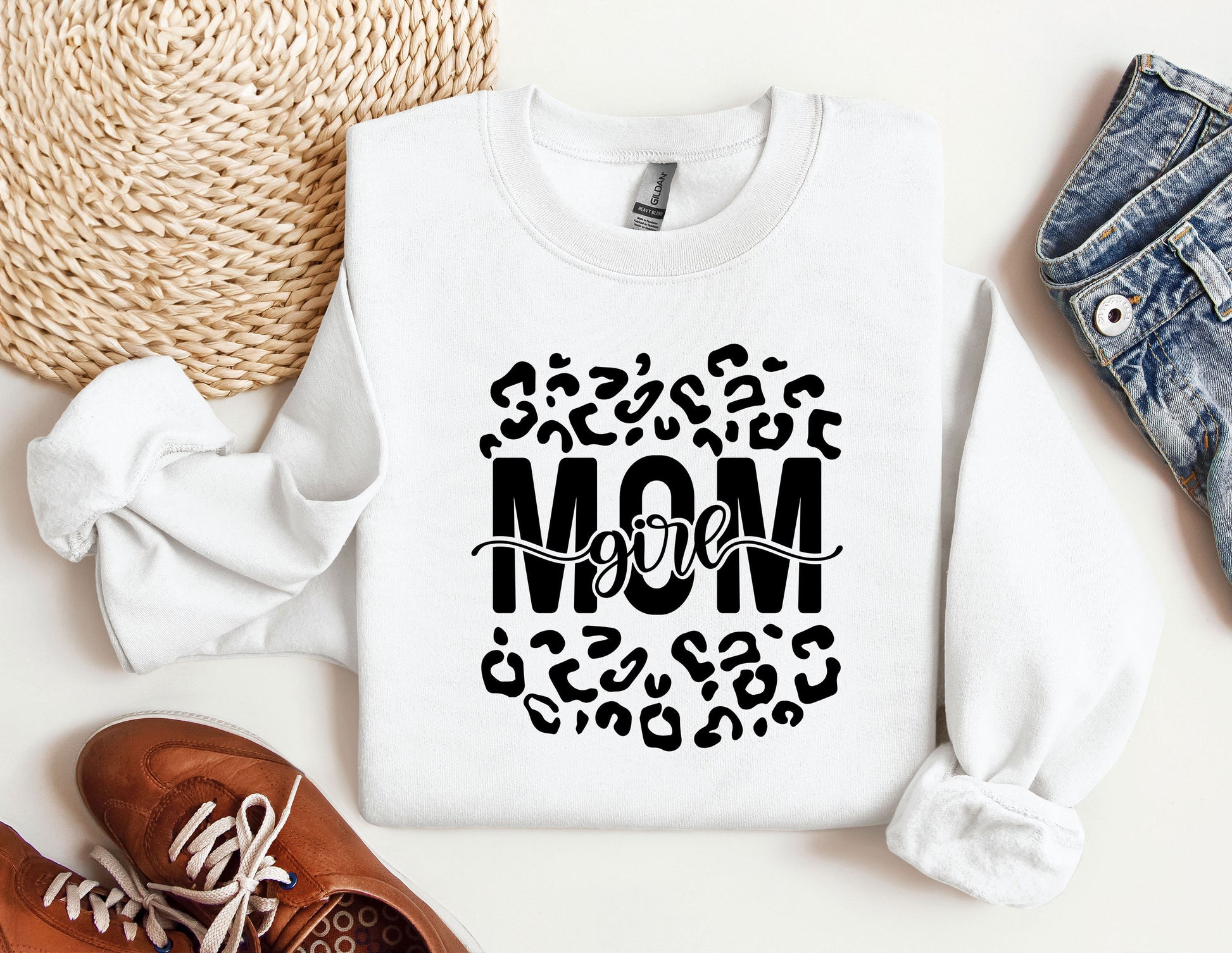 a sweater with the word mom printed on it