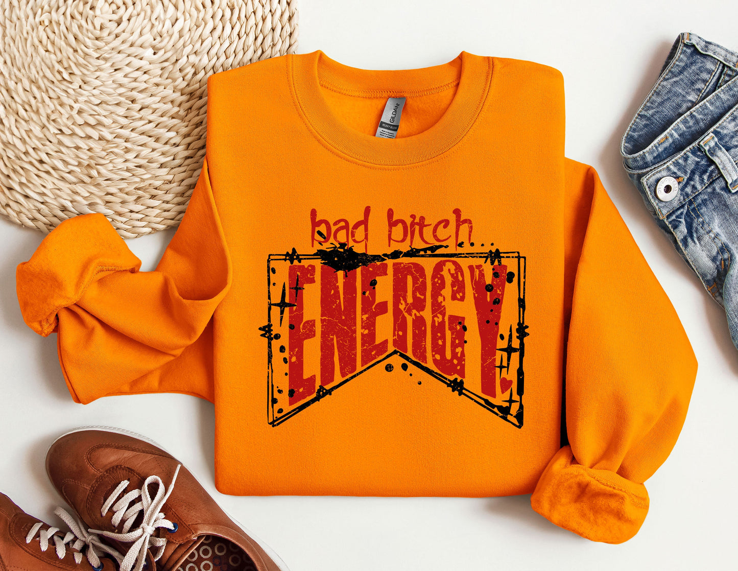 an orange sweatshirt with the words bad bitch energy on it