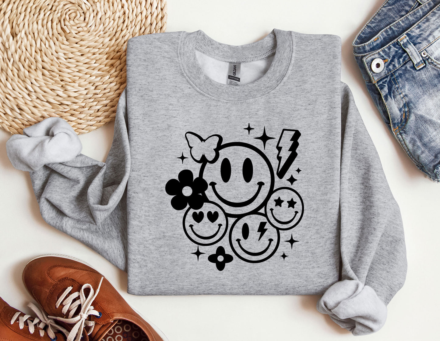 a sweatshirt with a smiley face on it