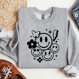 a sweatshirt with a smiley face on it