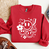 a red sweatshirt with a smiley face on it