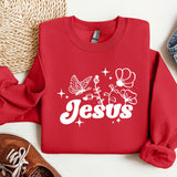 a red sweatshirt with the word jesus printed on it