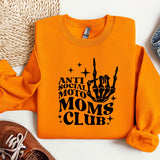 an orange sweatshirt with a black print on it