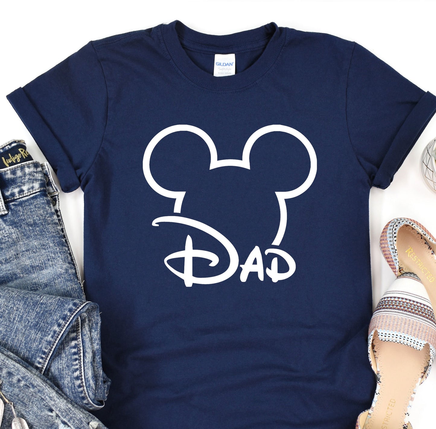 a t - shirt with the word dad on it