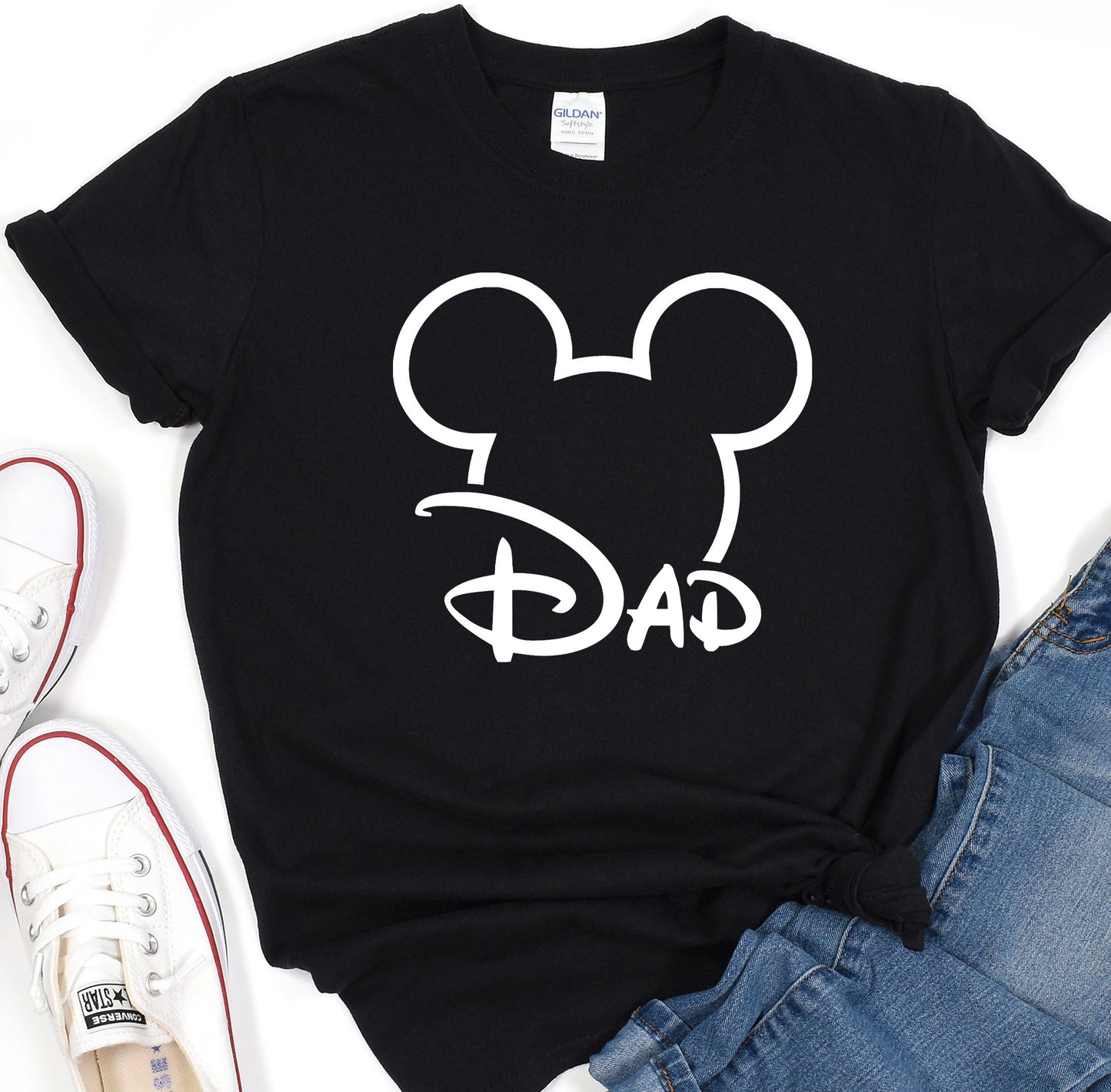 a black shirt with a mickey mouse dad on it