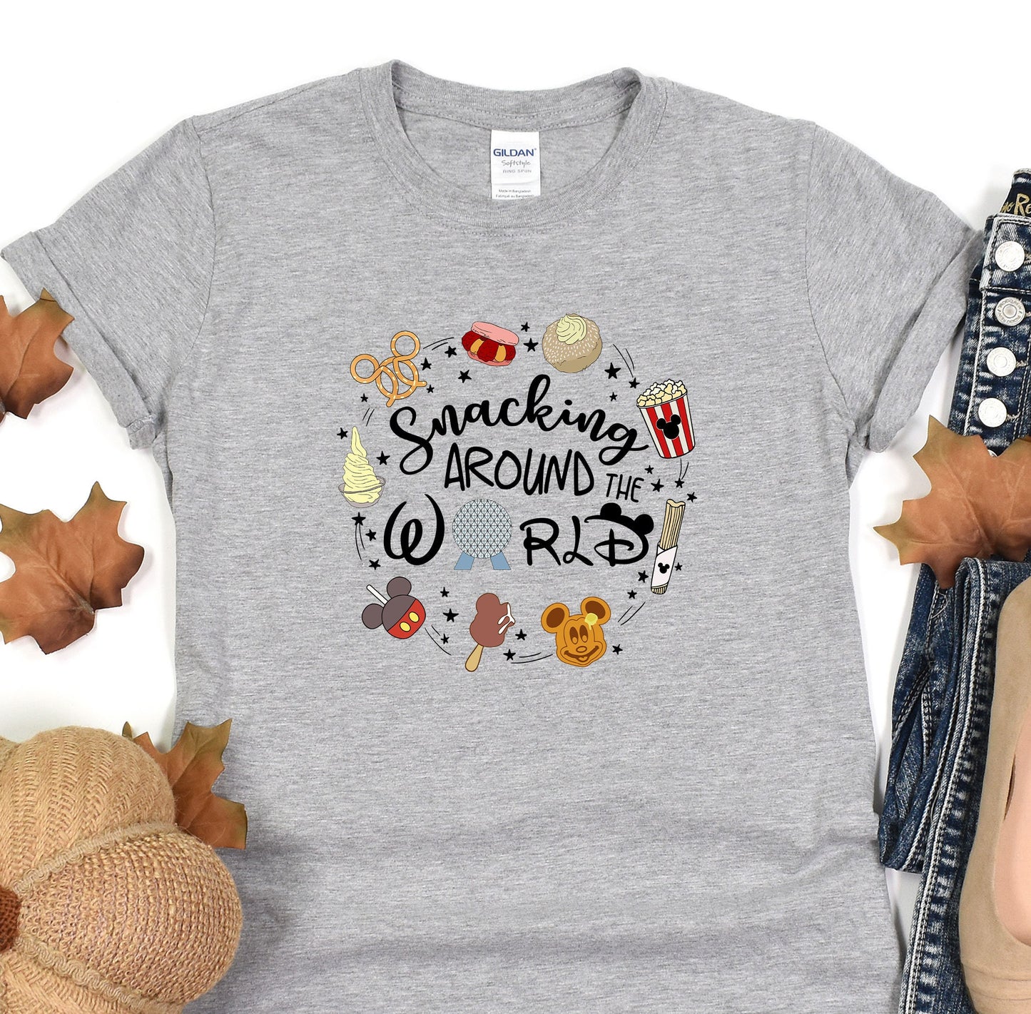 a t - shirt that says, snacking around the world