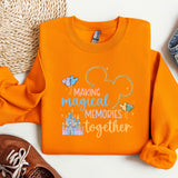a pair of shoes and an orange shirt with the words making magical memories together