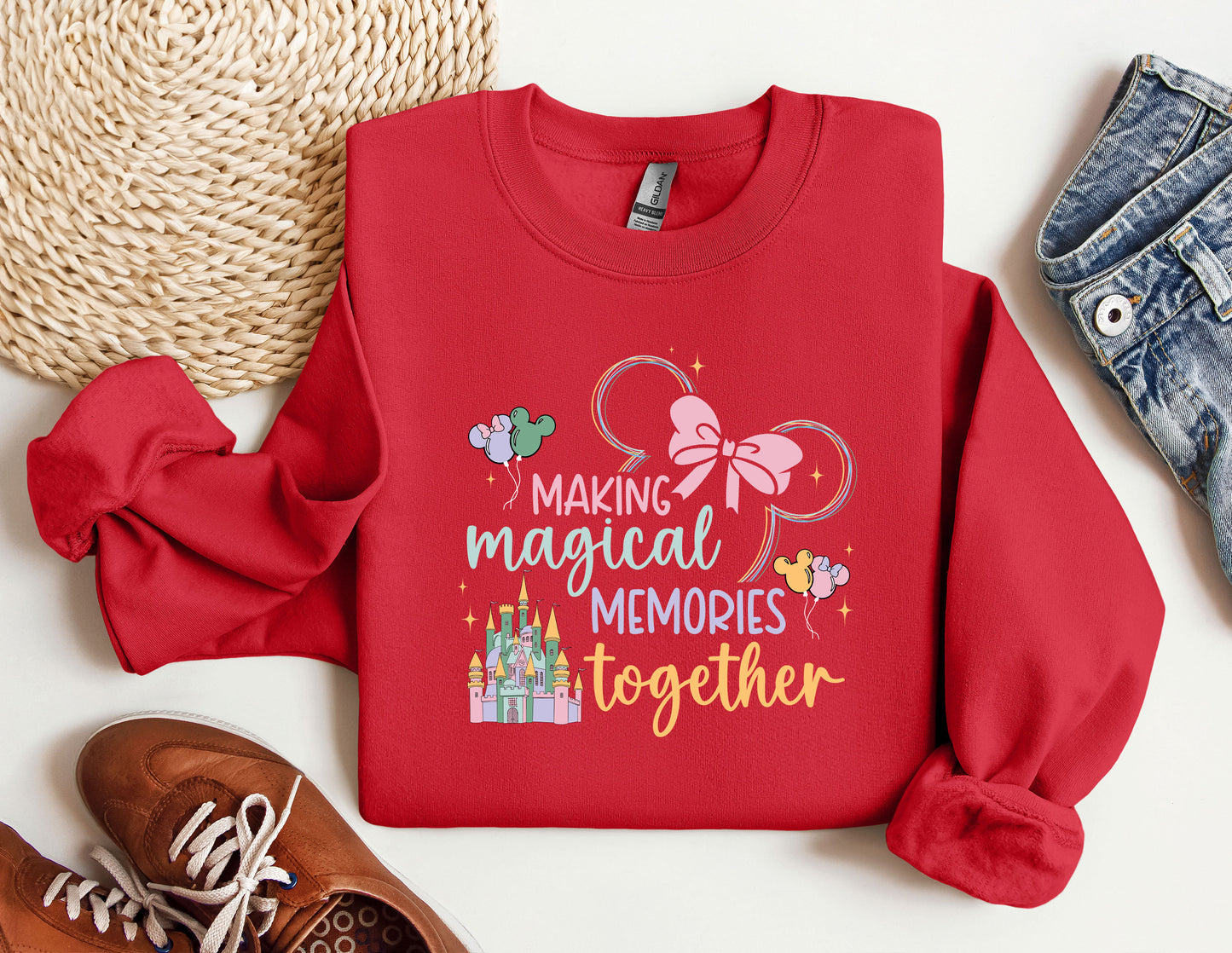 a red shirt that says making magical memories together