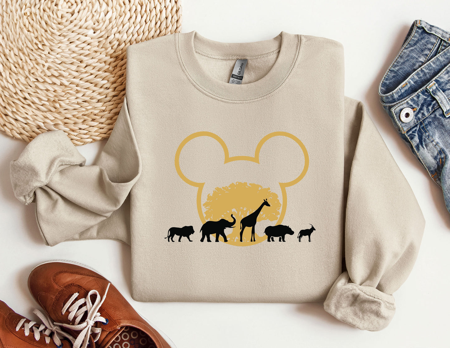 a sweater with a mickey mouse design on it