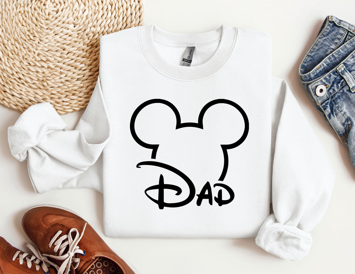 a mickey mouse shirt with the word dad on it