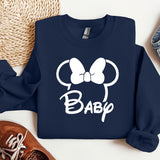 a mickey mouse shirt with a bow on it
