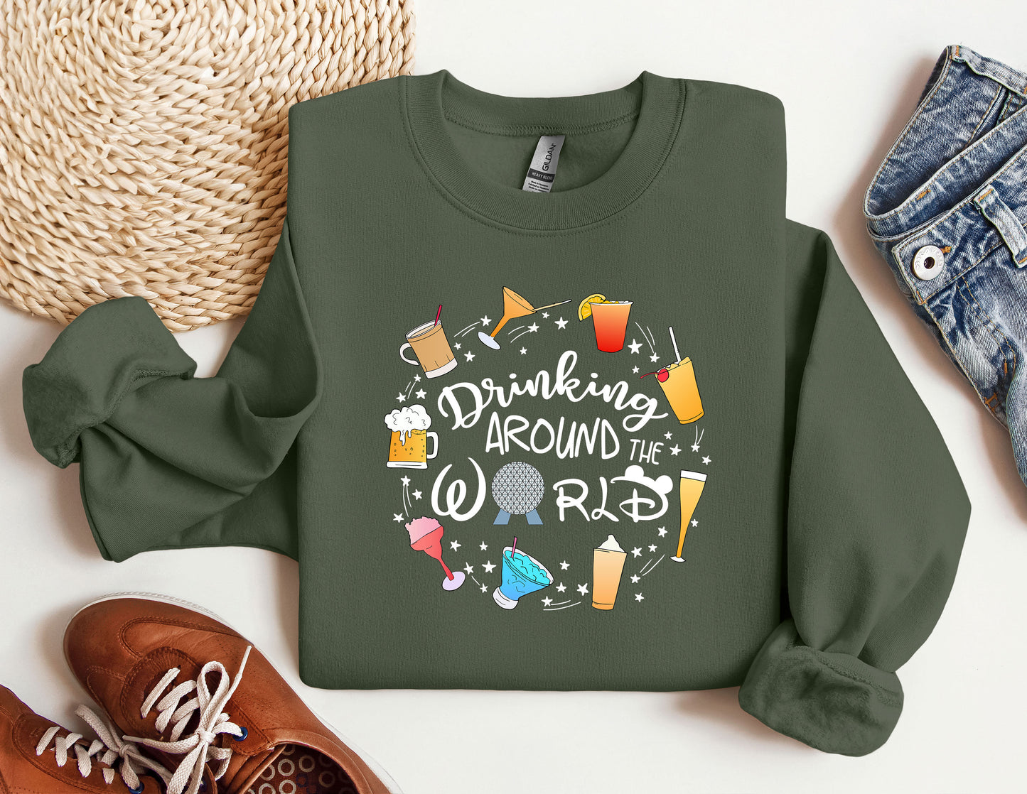 a green sweatshirt that says drink around the world