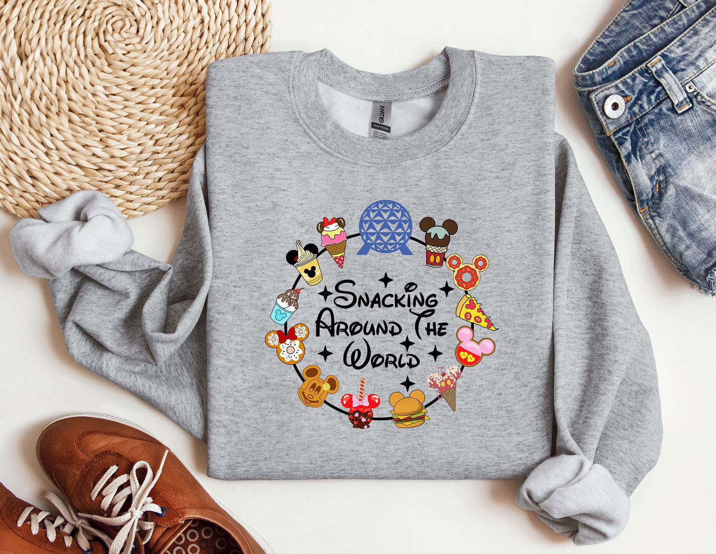 a sweatshirt with mickey mouse and other disney characters on it