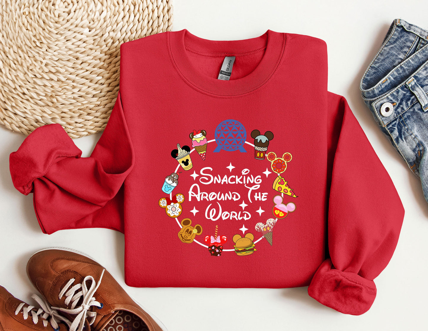 a red sweatshirt with a mickey mouse message on it