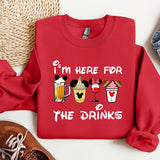 a red sweatshirt with a mickey mouse design on it