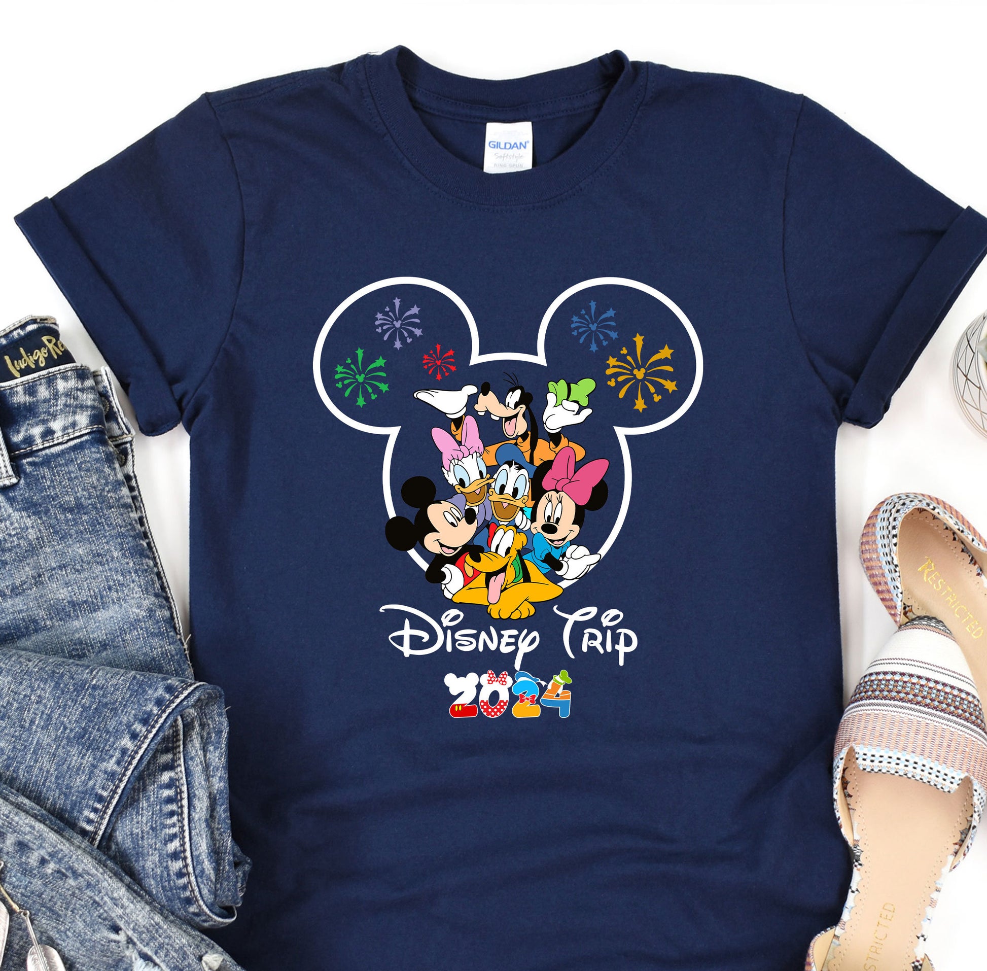 a mickey mouse t - shirt with mickey and friends on it