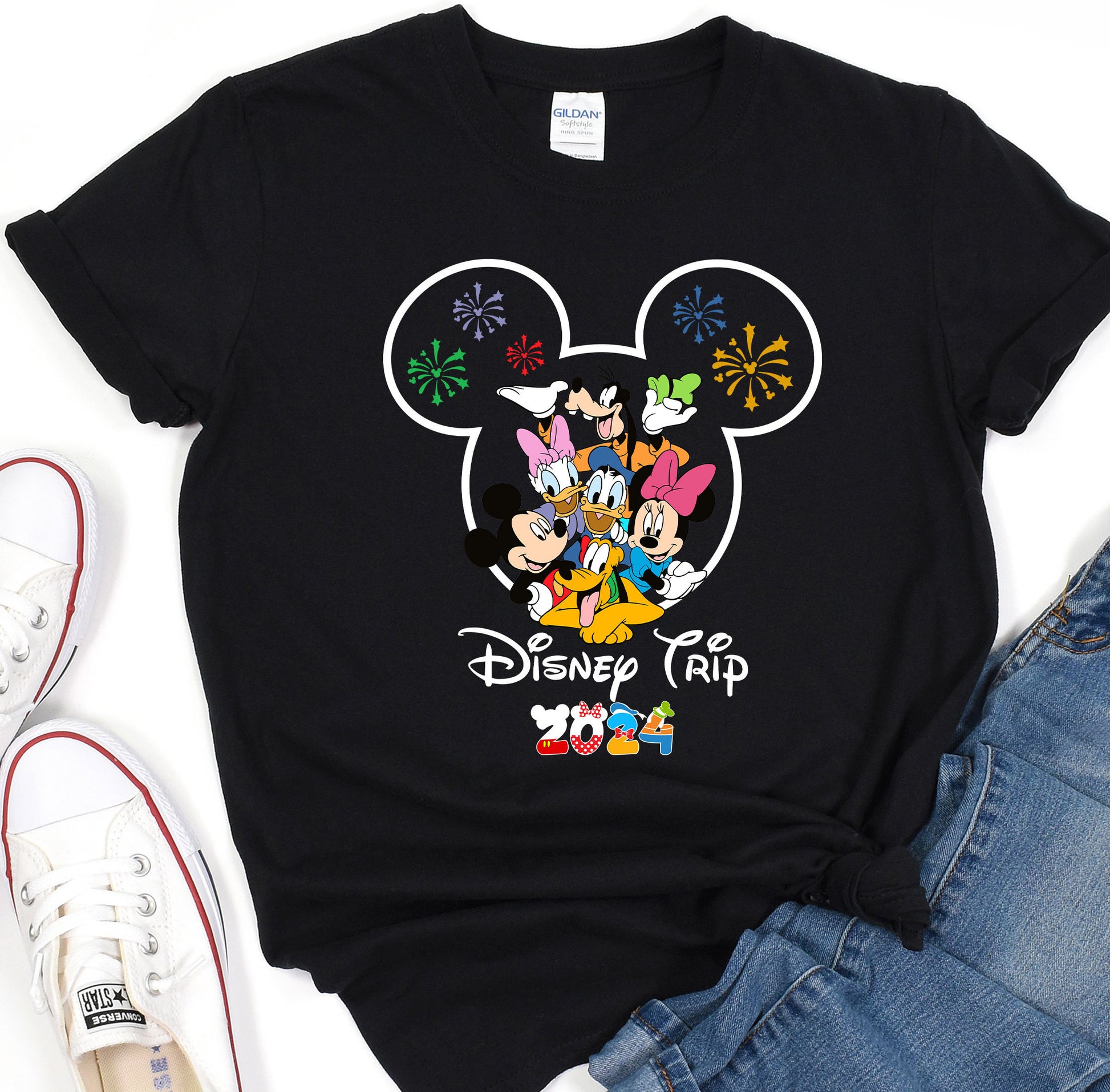 a black shirt with mickey mouse on it