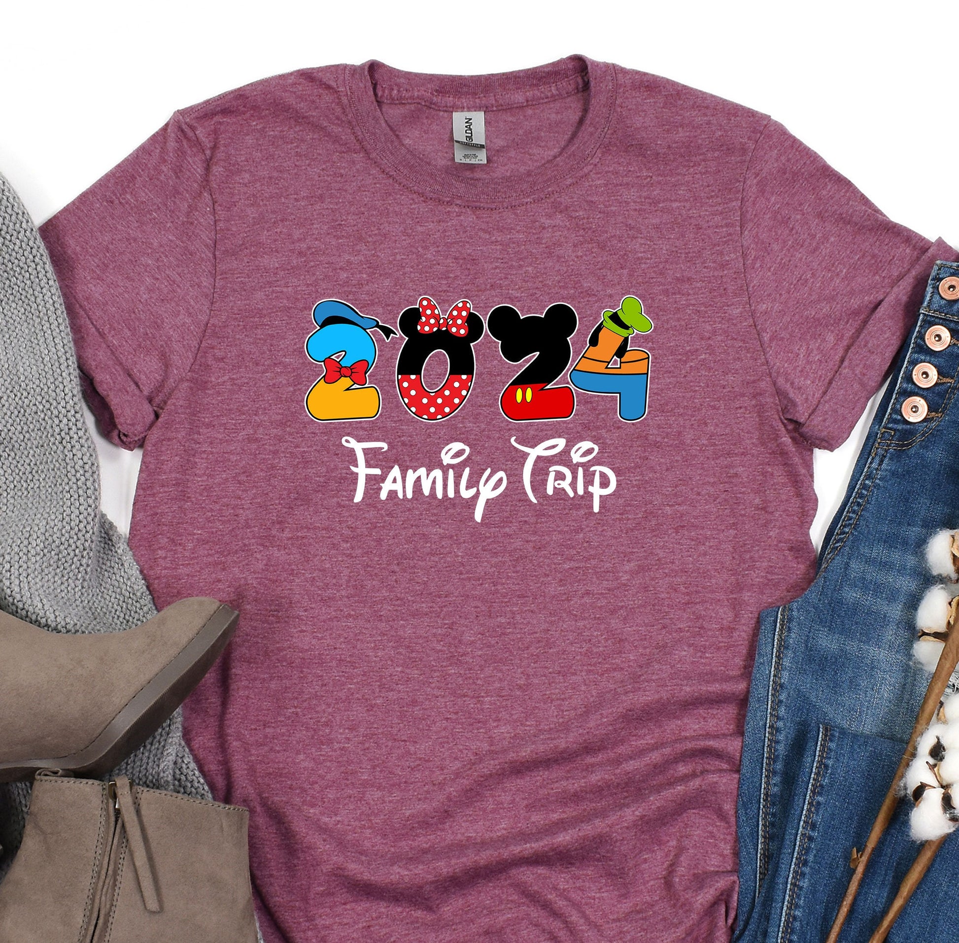 a t - shirt that says family trip with mickey mouse and minnie mouse