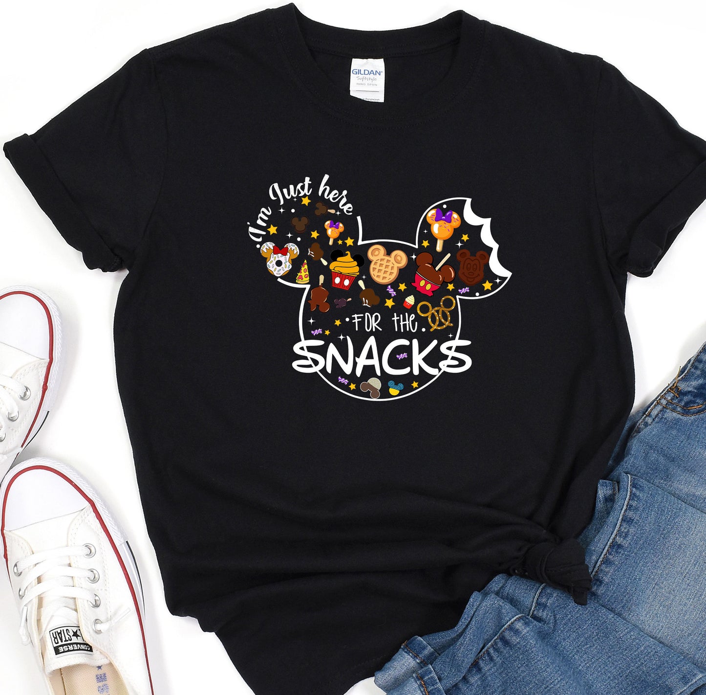 a black shirt with mickey mouse and mickey mouse heads on it