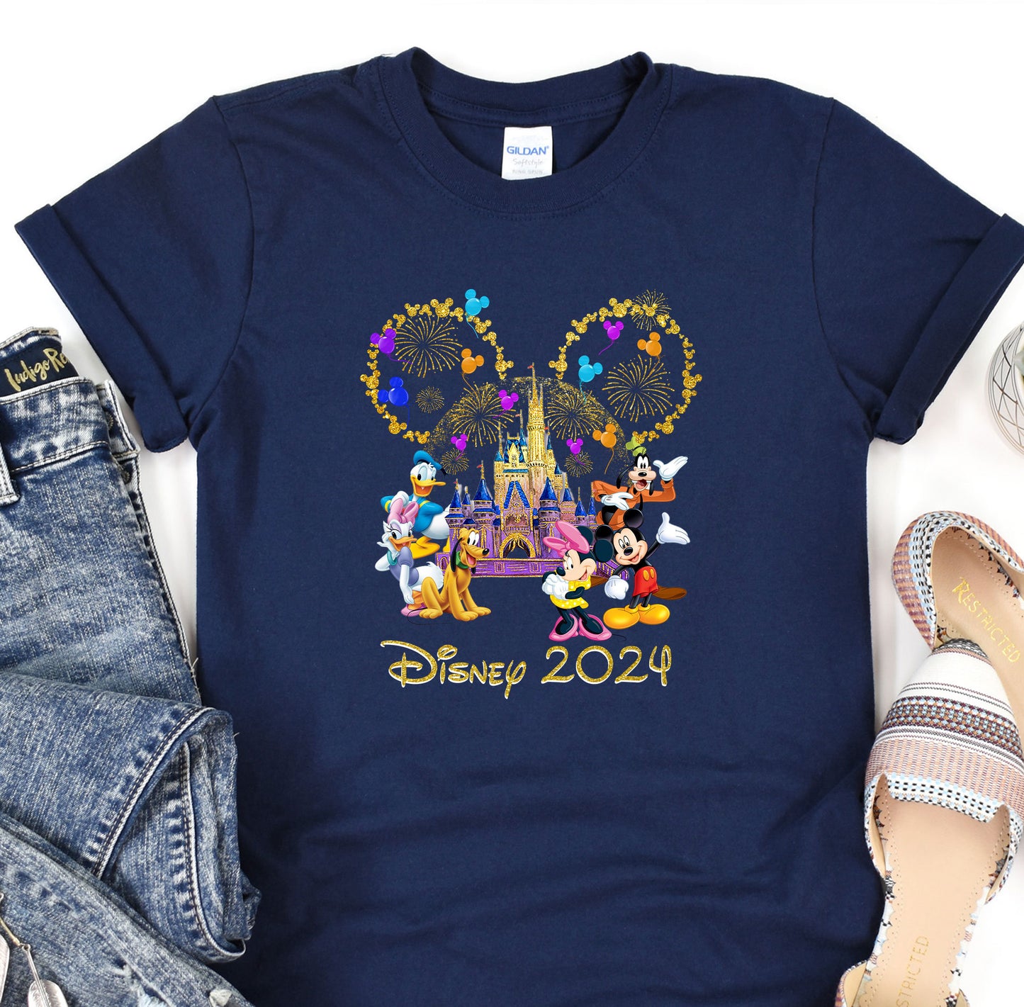 a disneyland shirt with mickey mouse and friends on it