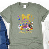 a mickey mouse shirt with mickey mouse and friends on it