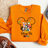 a pair of shoes and a mickey mouse shirt