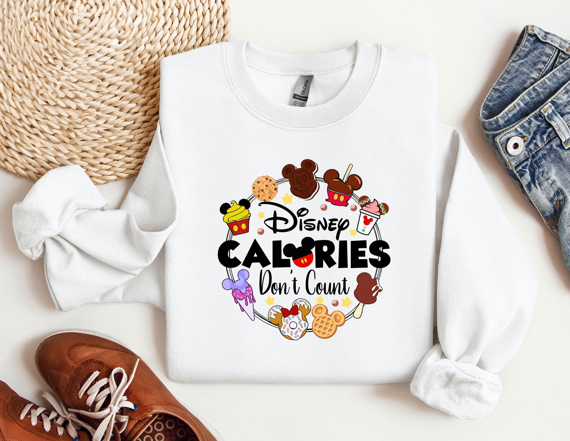 a white sweatshirt with the words disney calories on it