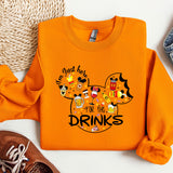 a pair of shoes and an orange shirt with mickey mouse on it