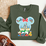 a green shirt with a mickey mouse head on it