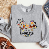 a mickey mouse shirt with the words i'm just here for the snacks