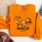an orange shirt with a mickey mouse design on it