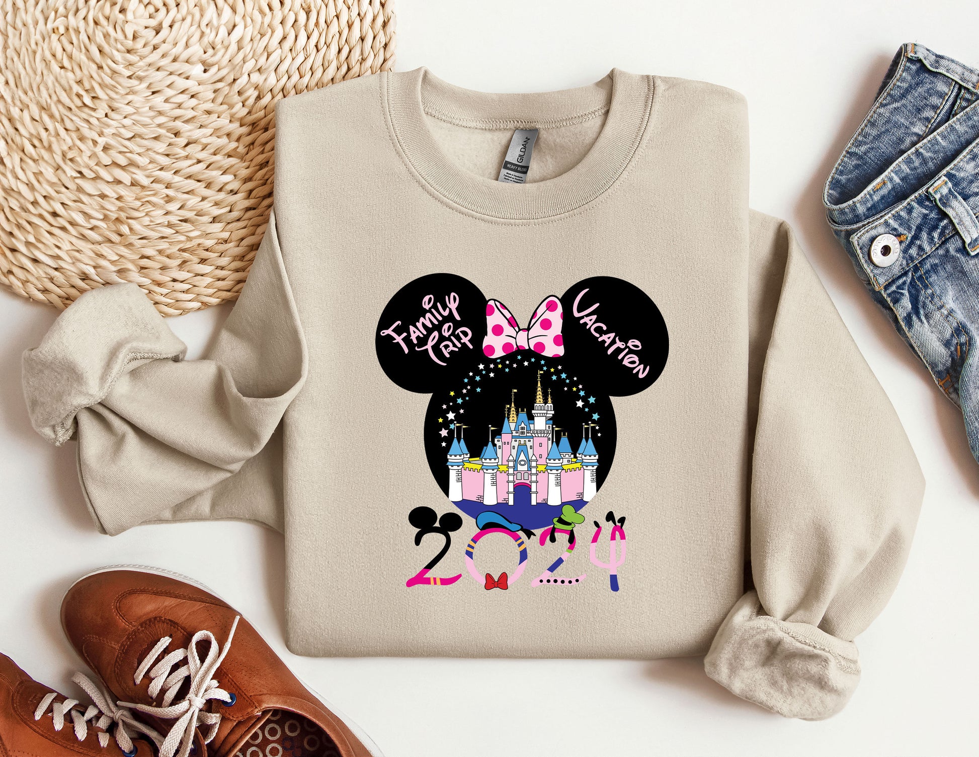 a sweater with a minnie mouse design on it