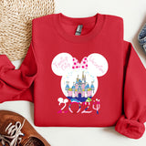 a red shirt with a minnie mouse design on it