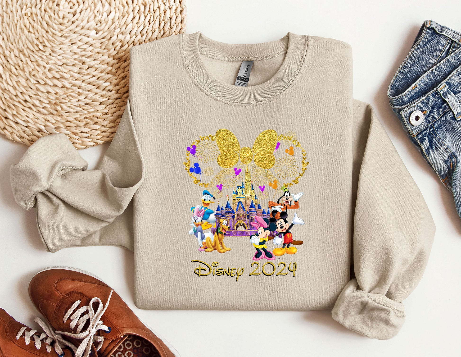 a sweater with a mickey mouse and mickey mouse on it