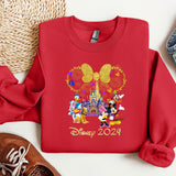 a red sweatshirt with mickey mouse and friends on it