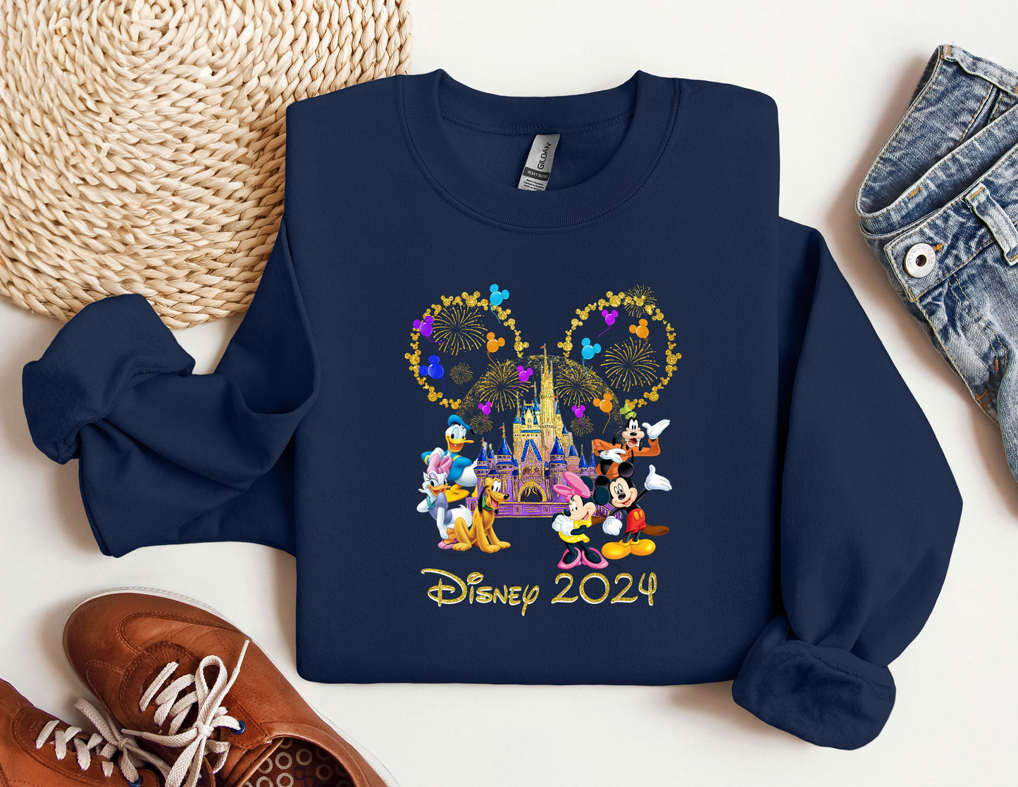 a blue sweatshirt with mickey mouse and friends on it