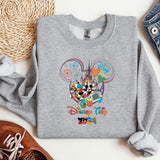 a mickey mouse shirt with mickey mouse heads on it