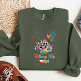 a green sweatshirt with mickey mouse on it