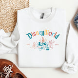 a white sweatshirt with the word disneyland printed on it