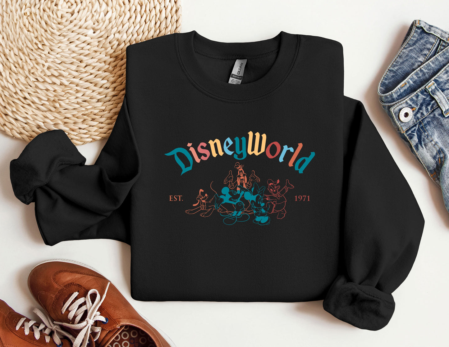 a black sweatshirt with the words disney world on it